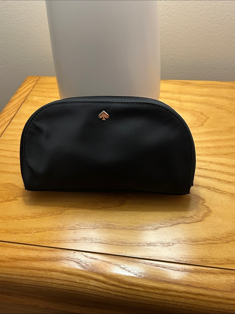 kate spade black nylon cosmetic pouch with silver spade logo
